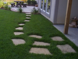 Flagstone in turf